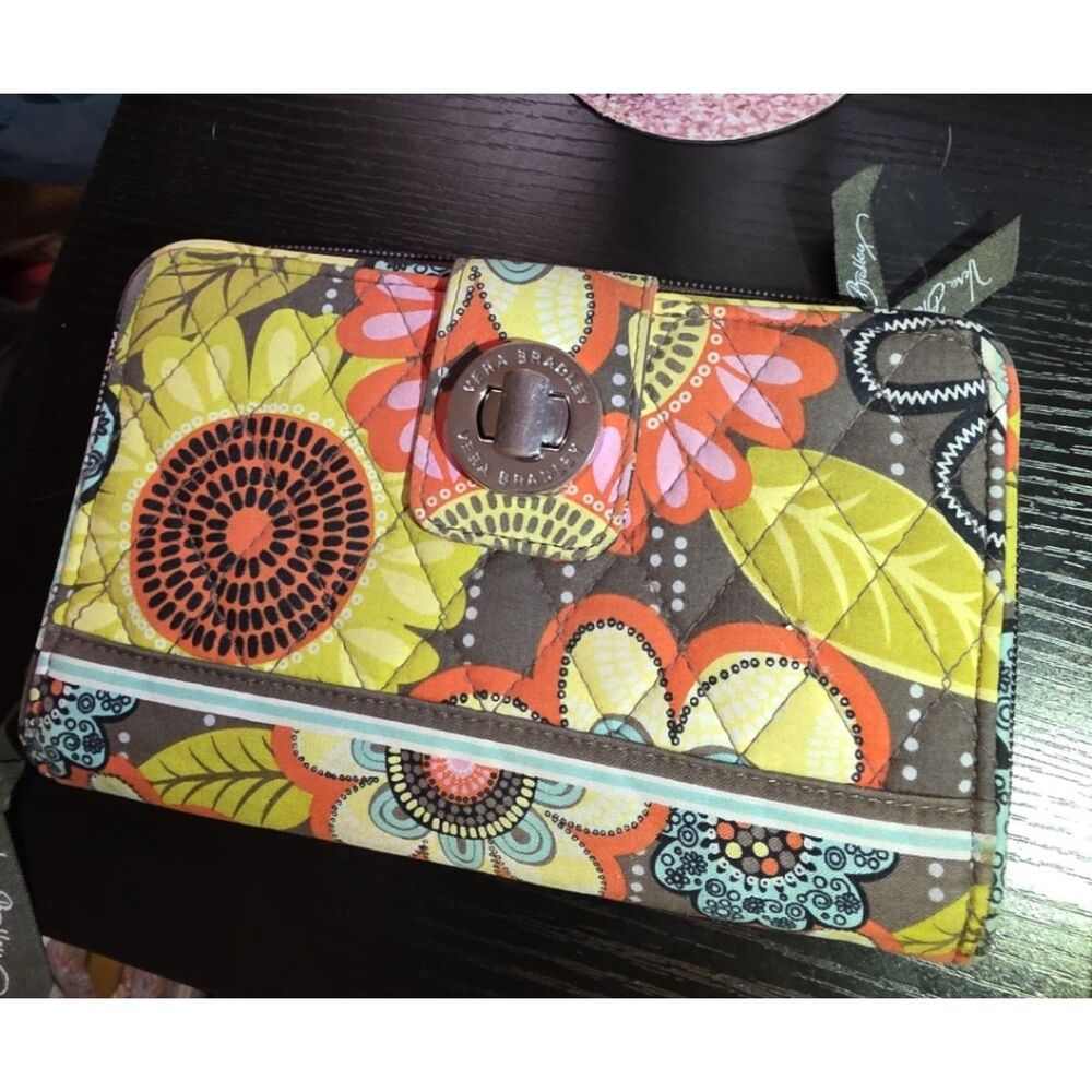 Vera Bradley Turnlock Wallet in a quilted floral pattern.